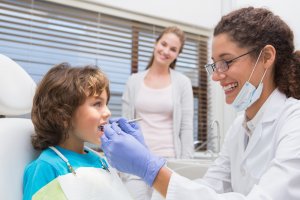 checking kids teeth