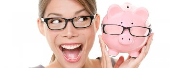 Woman with piggy bank saving money