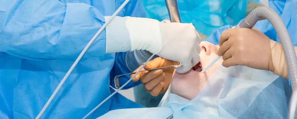 Dentist doing sinus lift surgery