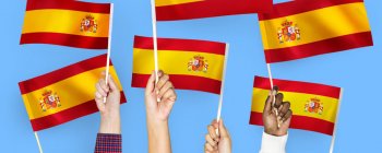 People waving Spanish flags