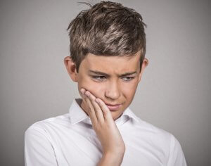 wisdom tooth symptoms