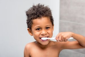 Boy brushing teeth