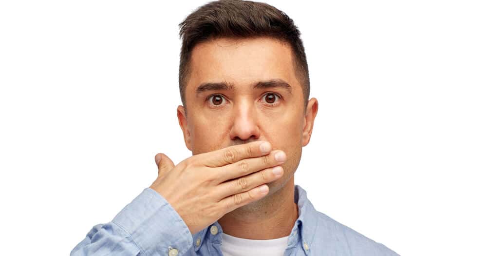 man wants to get rid of bad breath