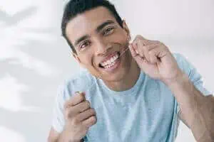 flossing with permanent retainer