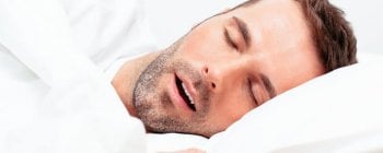 man sleeping with an open mouth