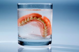 soak dentures at night