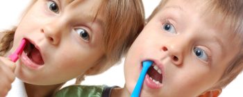 children with toothbrushes