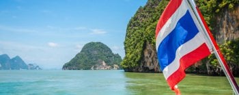 Thai flag on sea in Phuket