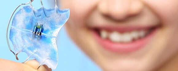 Teeth Retainer After Braces: Types, Costs and More