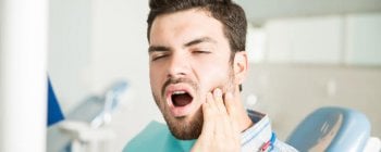 how to stop wisdom tooth pain
