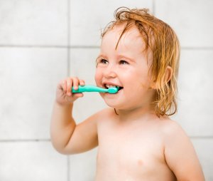 toddler brushing teeth