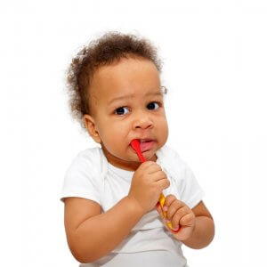 Kid brushing teeth