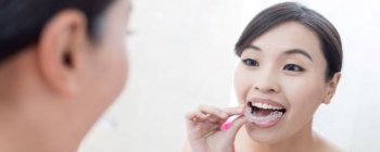 woman clear aligners