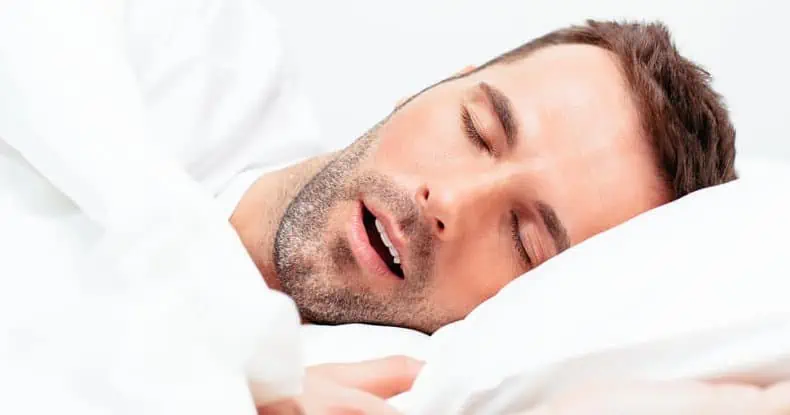man sleeping with an open mouth