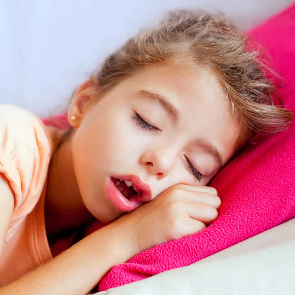 Child sleeping with mouth open