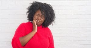 is tooth implant painful
