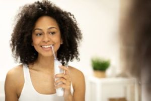 can waterpik damage gums