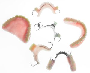 how to make partial dentures fit better