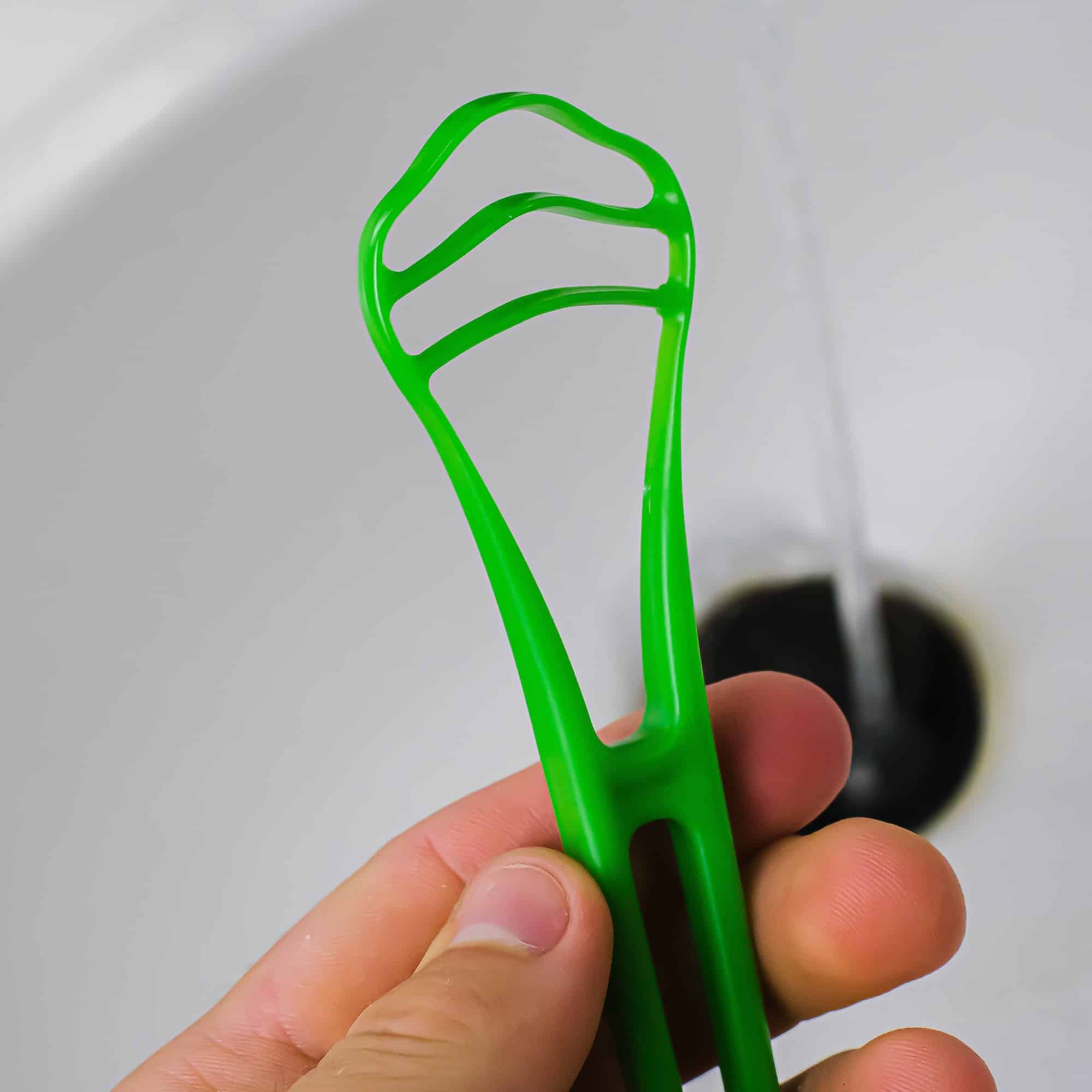 How to Use a Tongue Scraper and What's the Best One?