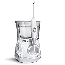 A white dental water flosser with a clear tank and handheld nozzle, designed for oral hygiene.
